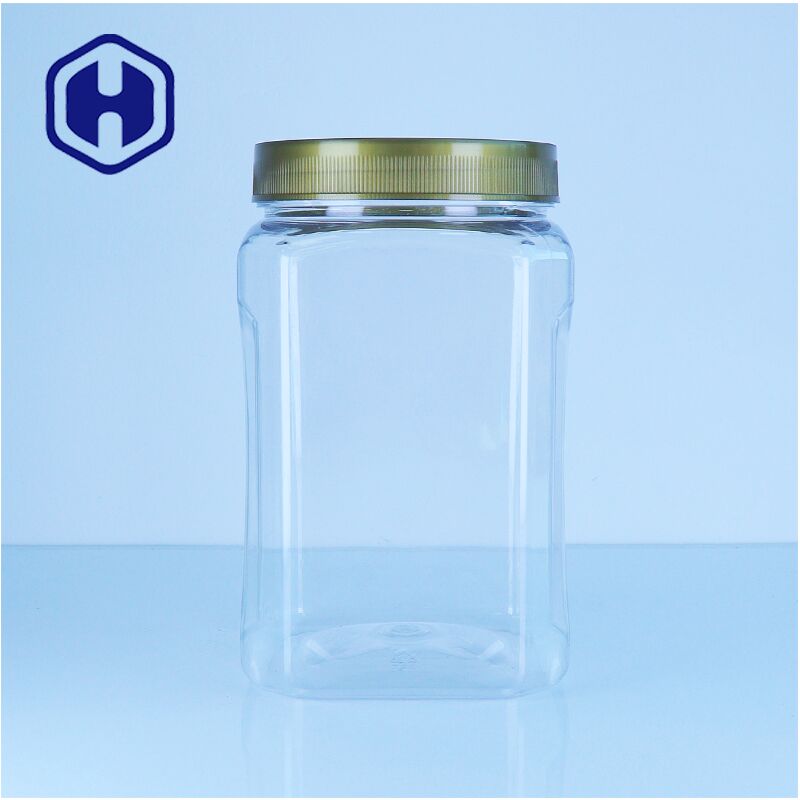 สี่เหลี่ยม PET ชัดเจน พลาสติกน้ําผึ้ง Jar กล่องสกรู อาหารเกรดถั่ว ผลไม้แห้ง ของหวาน ใส่ง่าย