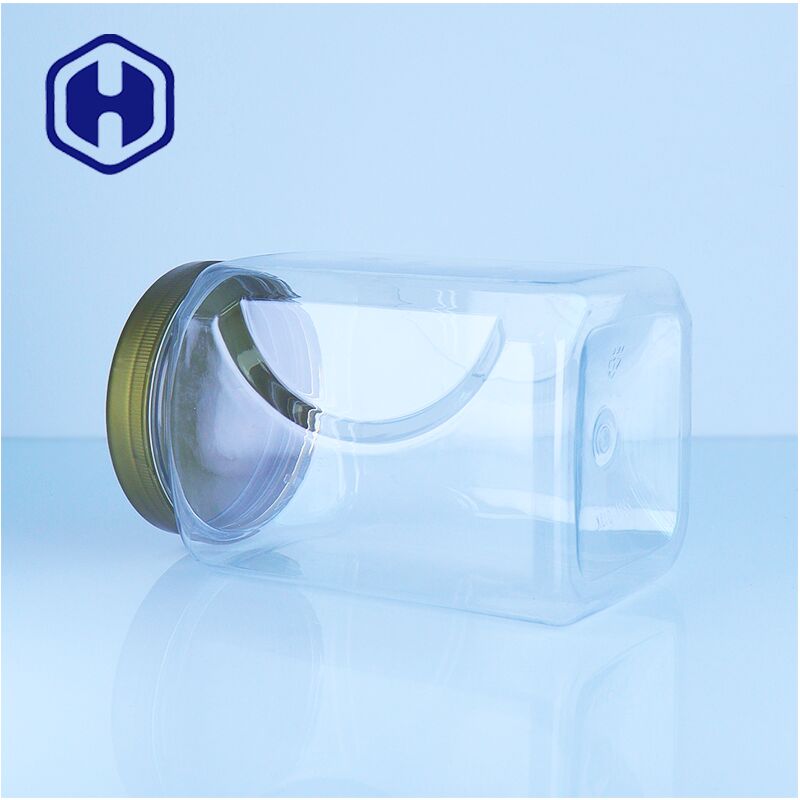 สี่เหลี่ยม PET ชัดเจน พลาสติกน้ําผึ้ง Jar กล่องสกรู อาหารเกรดถั่ว ผลไม้แห้ง ของหวาน ใส่ง่าย